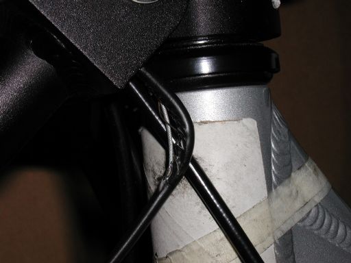 [closeup of burst Cruzbike Sofrider v2 shifter-cable]