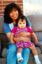 [Lyra sitting on Mom]